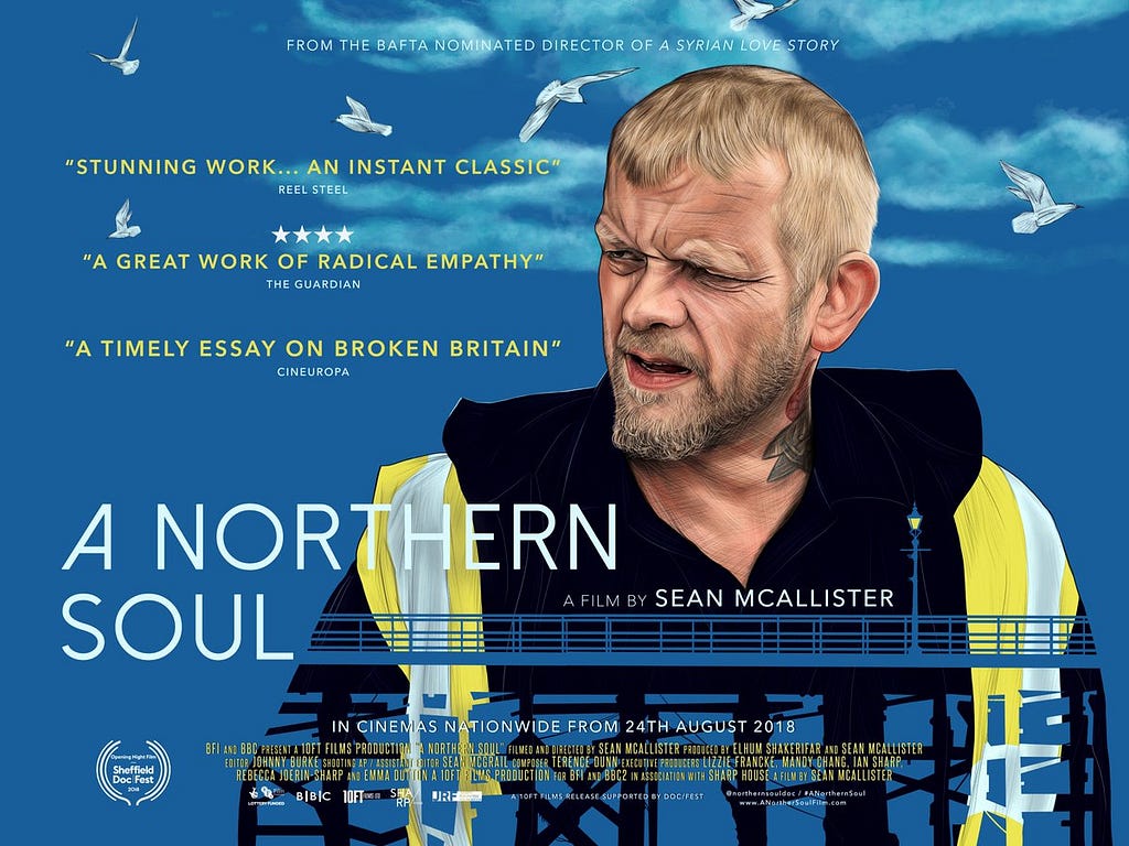 Film poster for ‘A Nothern Soul’ depicting a middle-aged man in a hi vis jacket in front of a blue sky with sea gulls.