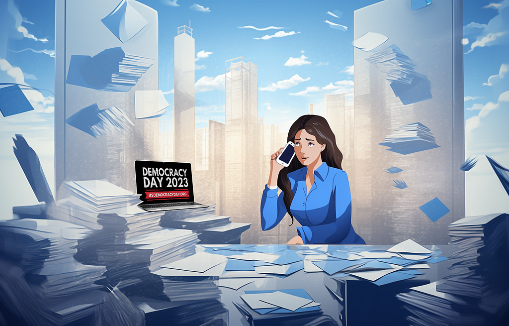 An illustration depicts a woman sitting at a desk in a high-rise office building with ethereal blue and white tones of sunlight cascading off the skyscrapers in the background. The woman is wearing a blue collared shirt and is holding a smartphone up to her ear as if she is on the phone. Her desk is absolutely littered with stacks of papers and documents, with a laptop sitting open on one of the stacks. On the laptop screen is the Democracy Day 2023 logo.