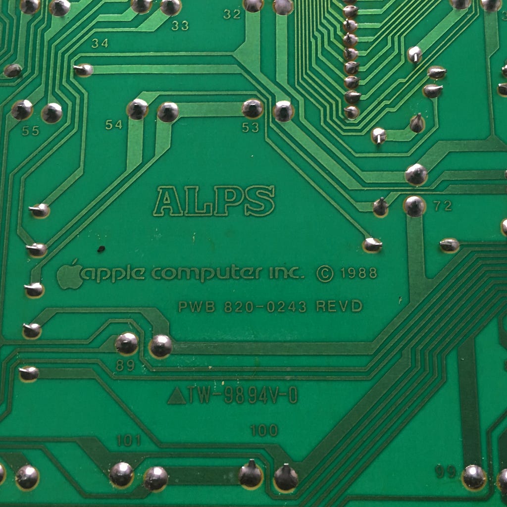 Back of the PCB from my AEK2 model — sticky coffee stamps everywhere!