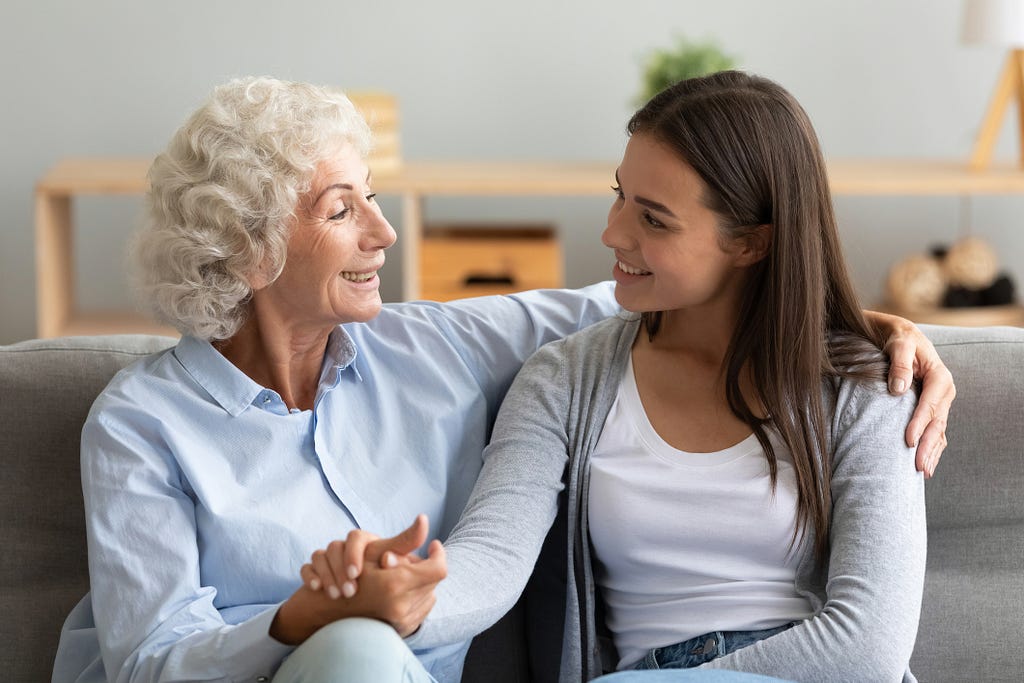 A mother and daughter in conversation.