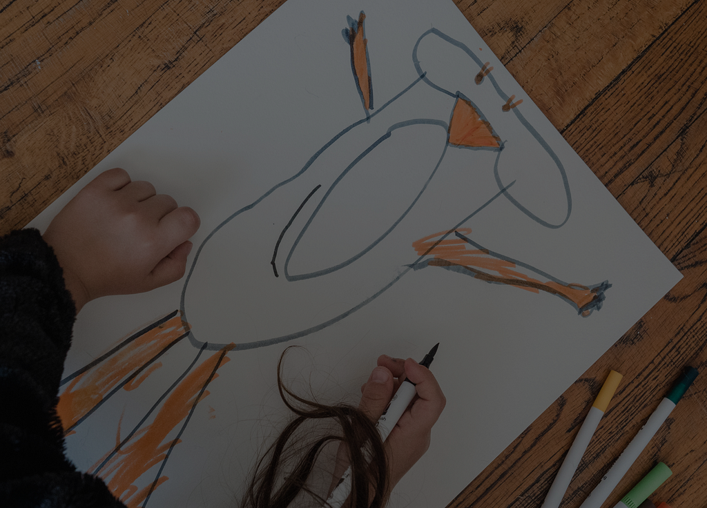 child drawing a picture