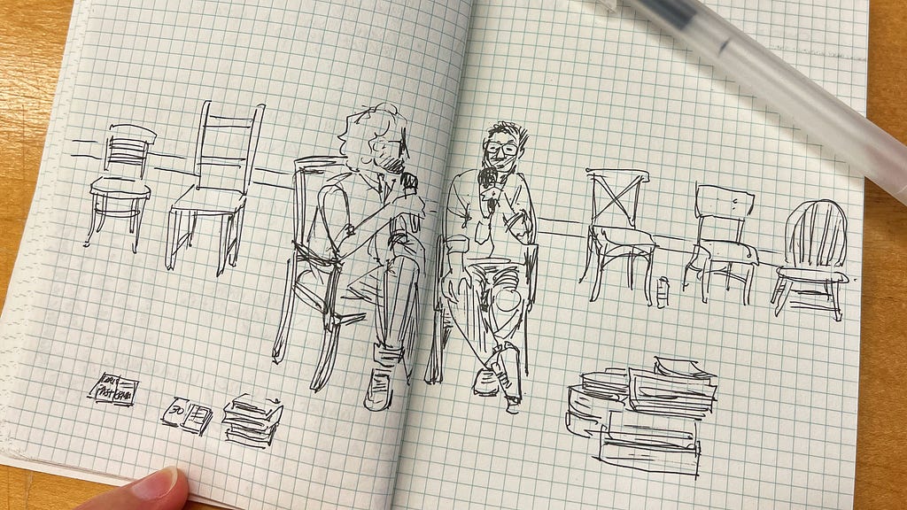 Illustration of two men sitting and talking with five empty chairs in the background