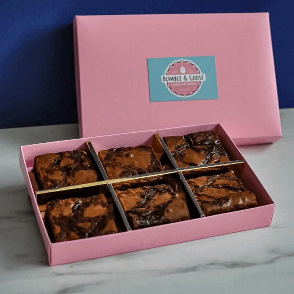 6 delicious brownies are packed in custom packaging