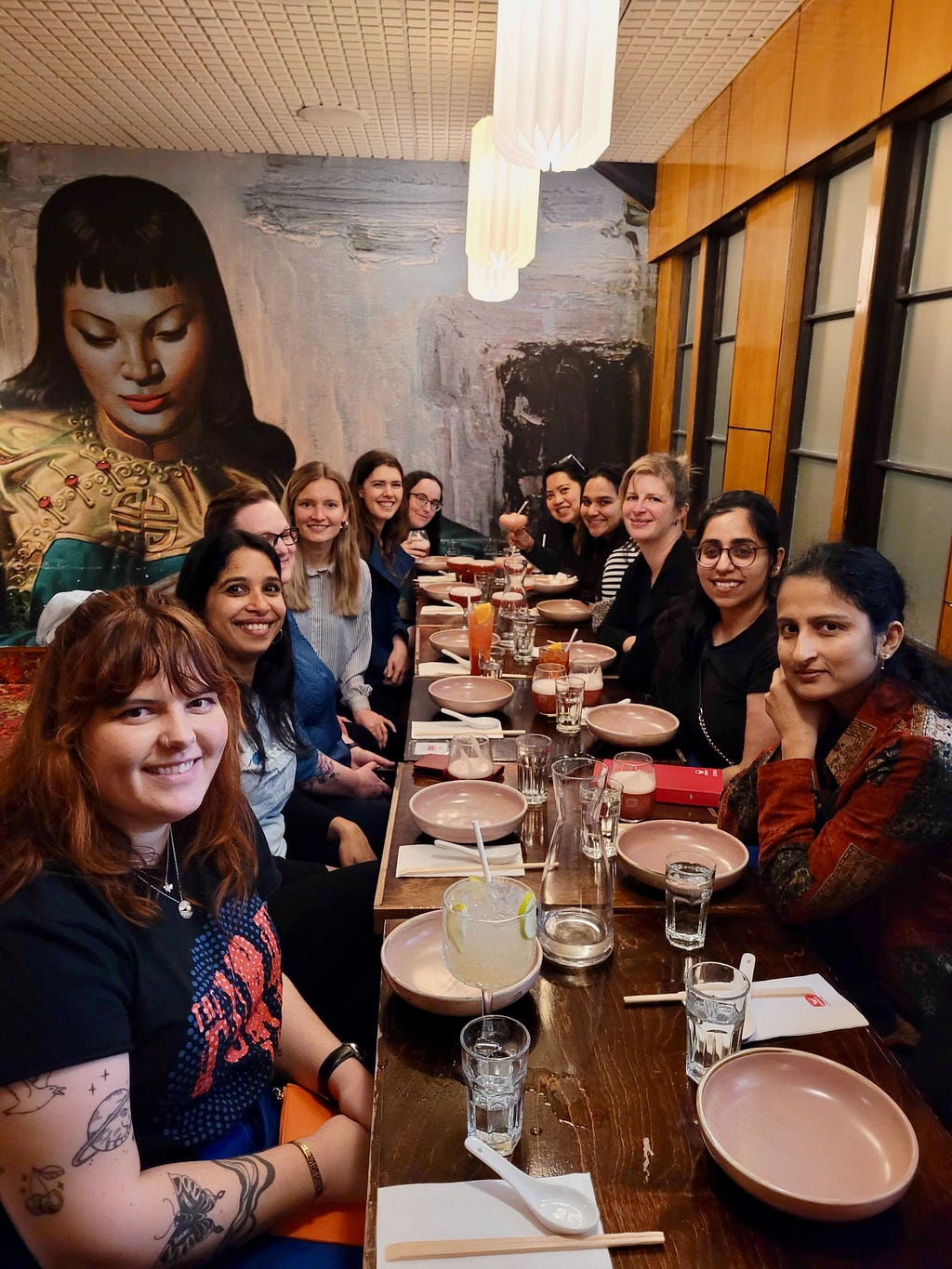 12 women software engineers at a dinner table