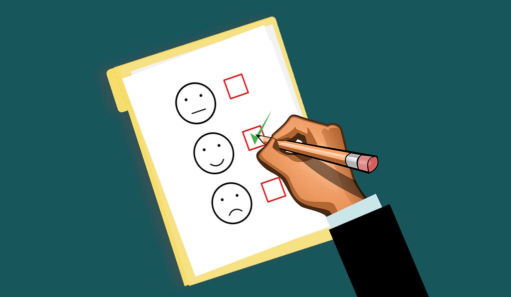 A cartoon hand completing a survey. Out of three faces, the user is selecting the happy face by putting a tick next to it.