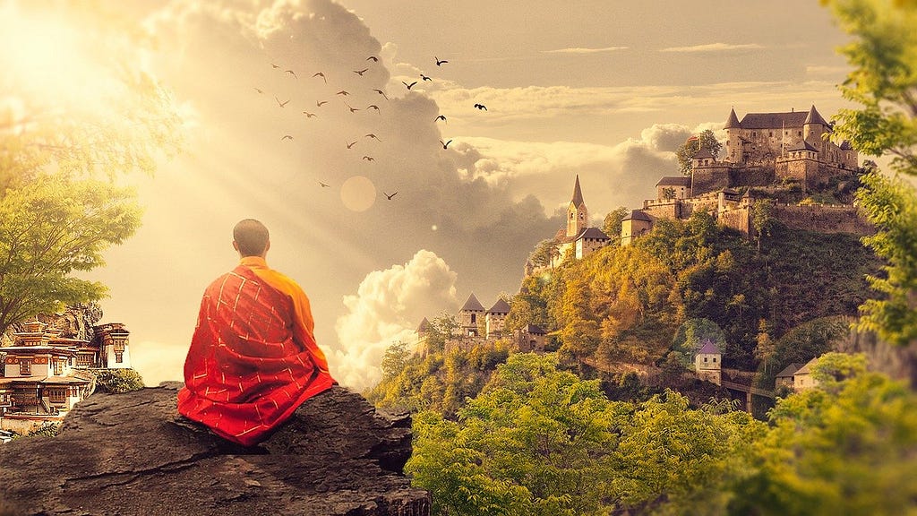 buddhism monk meditating in the mountains