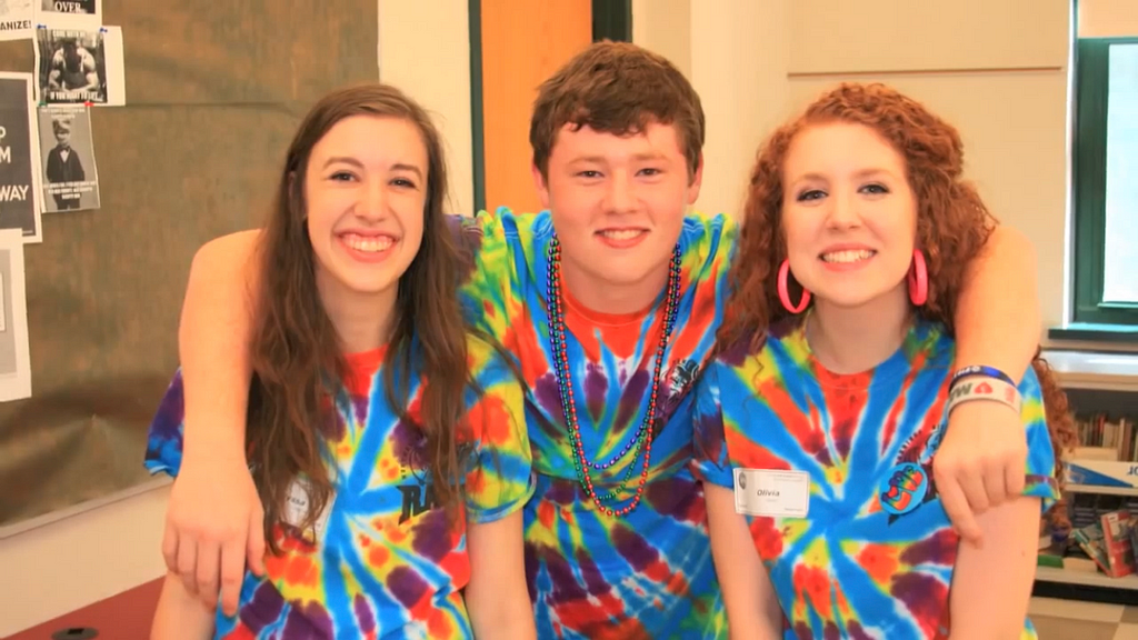 A photo of the article author with two female friends in high school.