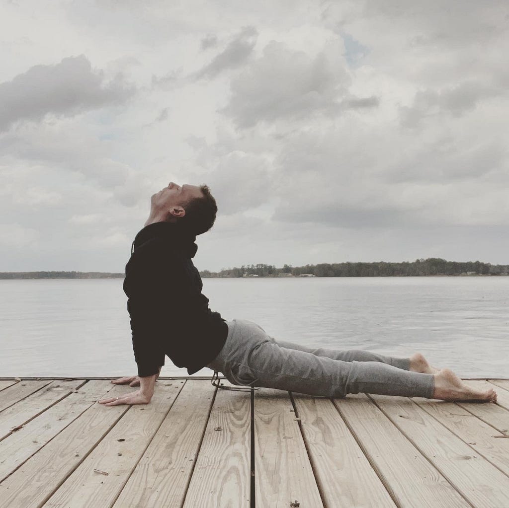 Ryan Rogers practicing yoga