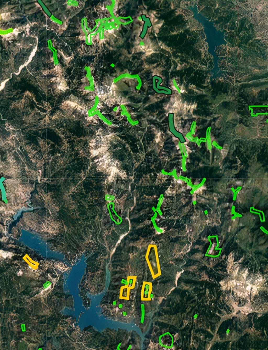 Geomorphological map of Agrafa mountain in Central Greece. All colorful polygons show wind power stations in the region. Areas with light green color describe the stations with production licenses. Those with dark green show stations with installation licenses. Light blue areas are stations with operational licenses. Yellow areas indicate stations that are under evaluation for future production. (map by geo.rae.gr)