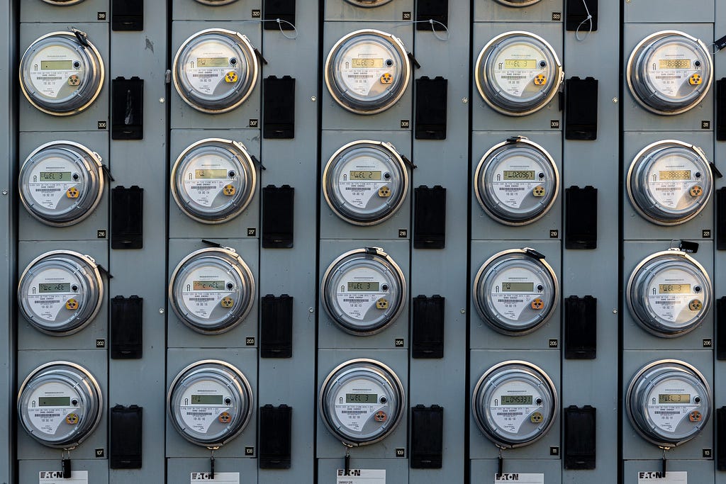 A bank of utility meters in Indiana. Photo by Jon Moore