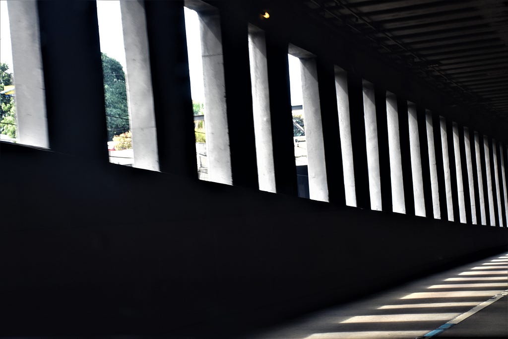 an underpass with some natural lighting