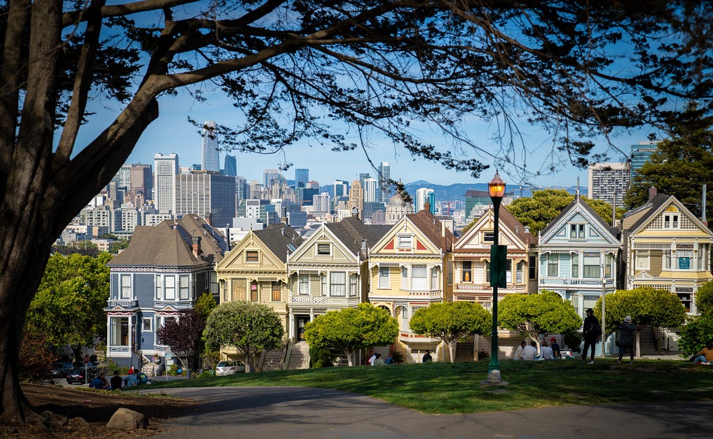 Photo of the colorful homes near Alamo Square Park in San Francisco by Minko Gechev