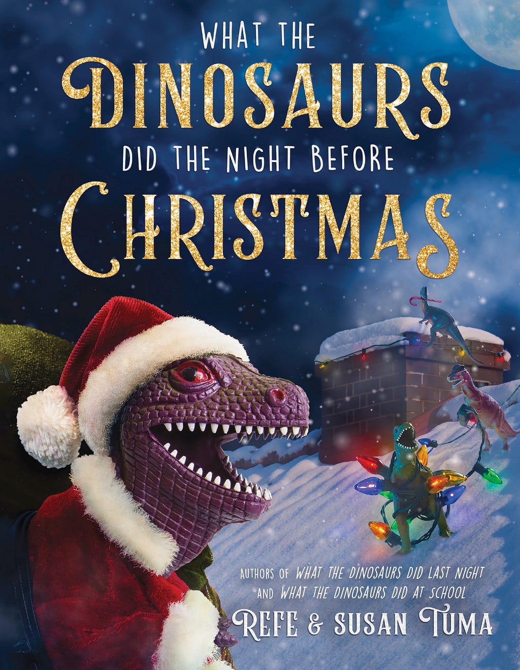 The cover of our new picture book WHAT THE DINOSAURS DID THE NIGHT BEFORE CHRISTMAS, featuring a purple plastic dinosaur wearing a Santa costume on a snowy rooftop.