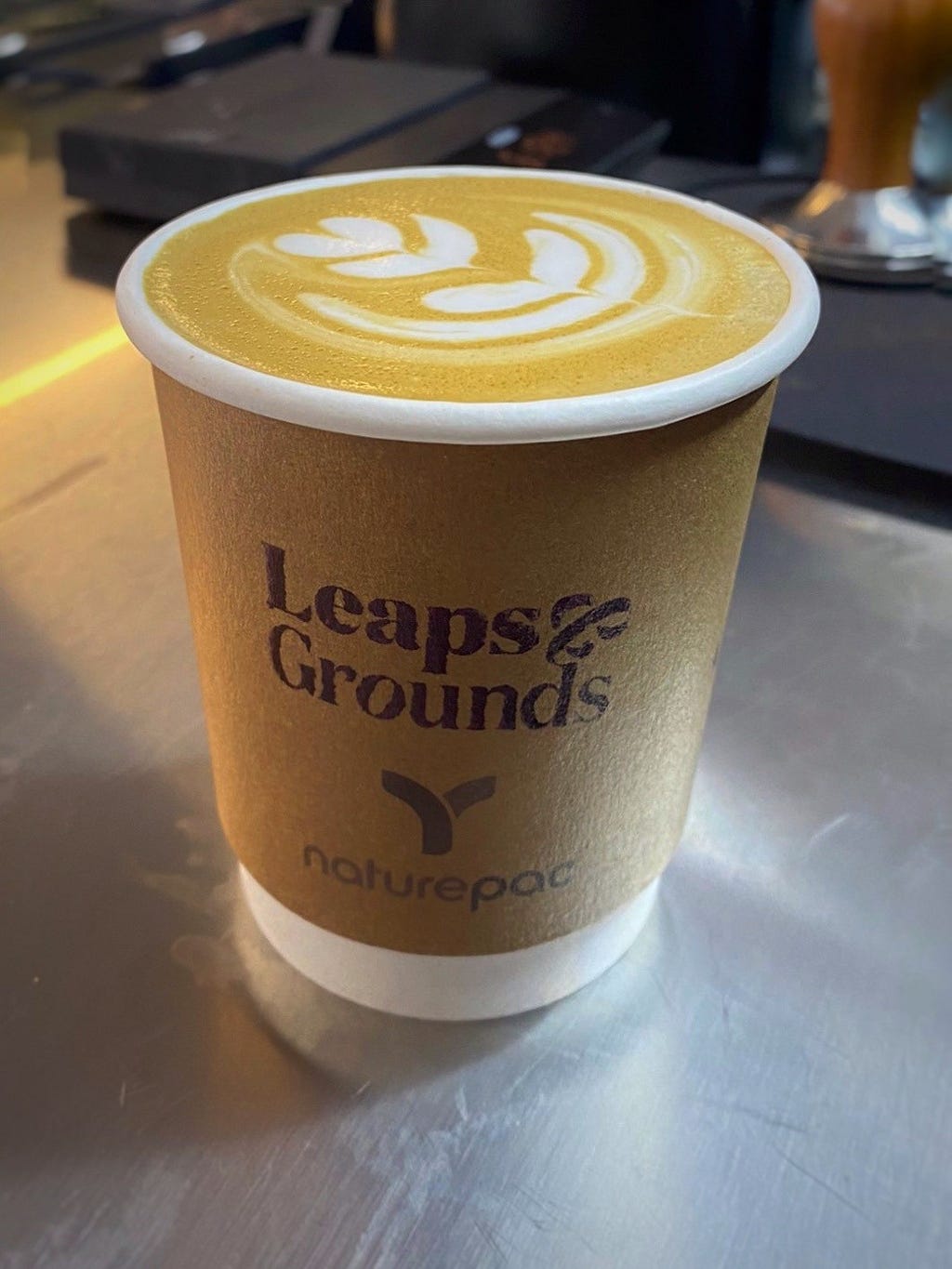 A cup of coffee from Leaps and Grounds
