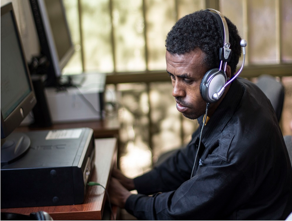 A man with visual impairments is receiving ICT training at Together!’s training centre in Ethiopia
