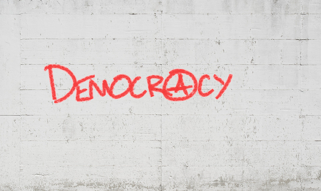 Democracy with an ‘a’ as the symbol of anarchism.