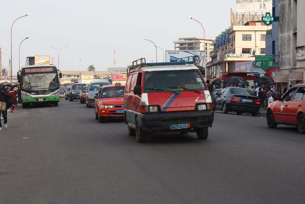 Bus , taxis , and a “wôro-wôro”.