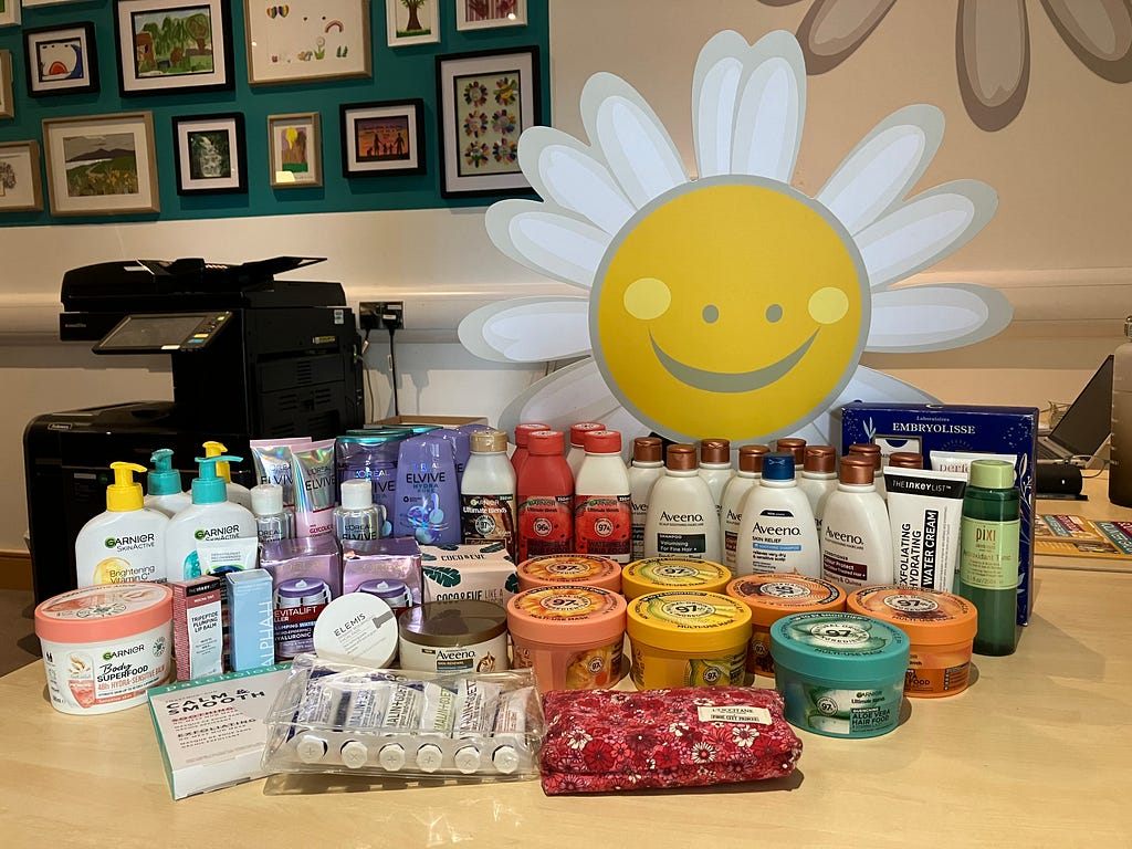 Image of toiletries that were donated to Daisy Lodge including shampoo, conditioner, and moisturiser