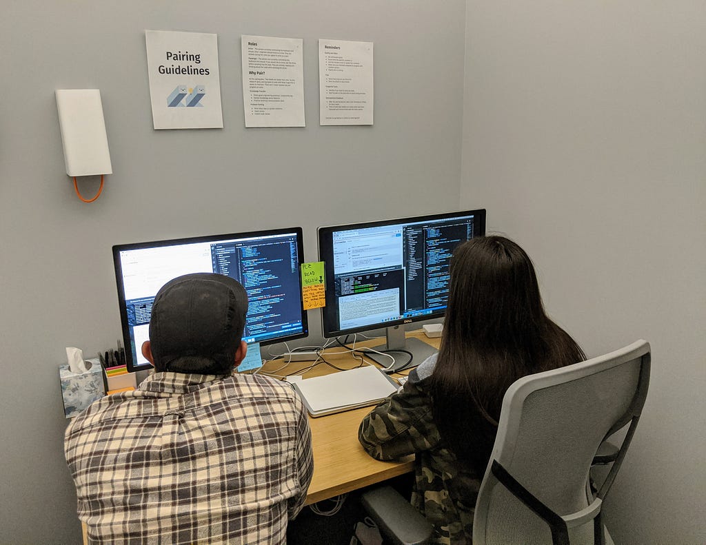 Two of our engineers during a pairing session