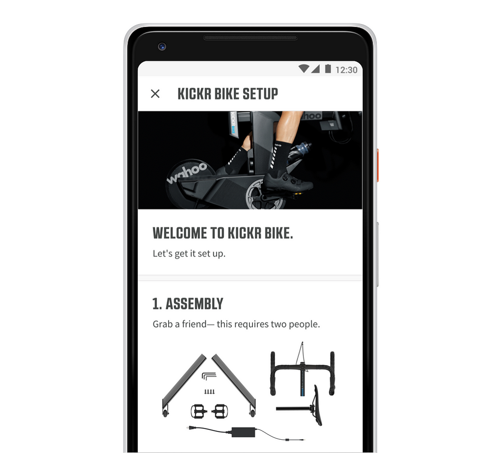 An Android phone showing UI that welcomes the user to KICKR BIKE.