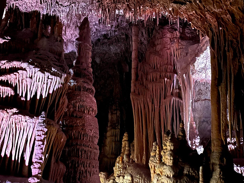 Decorated limestone caverns lit beautifully.