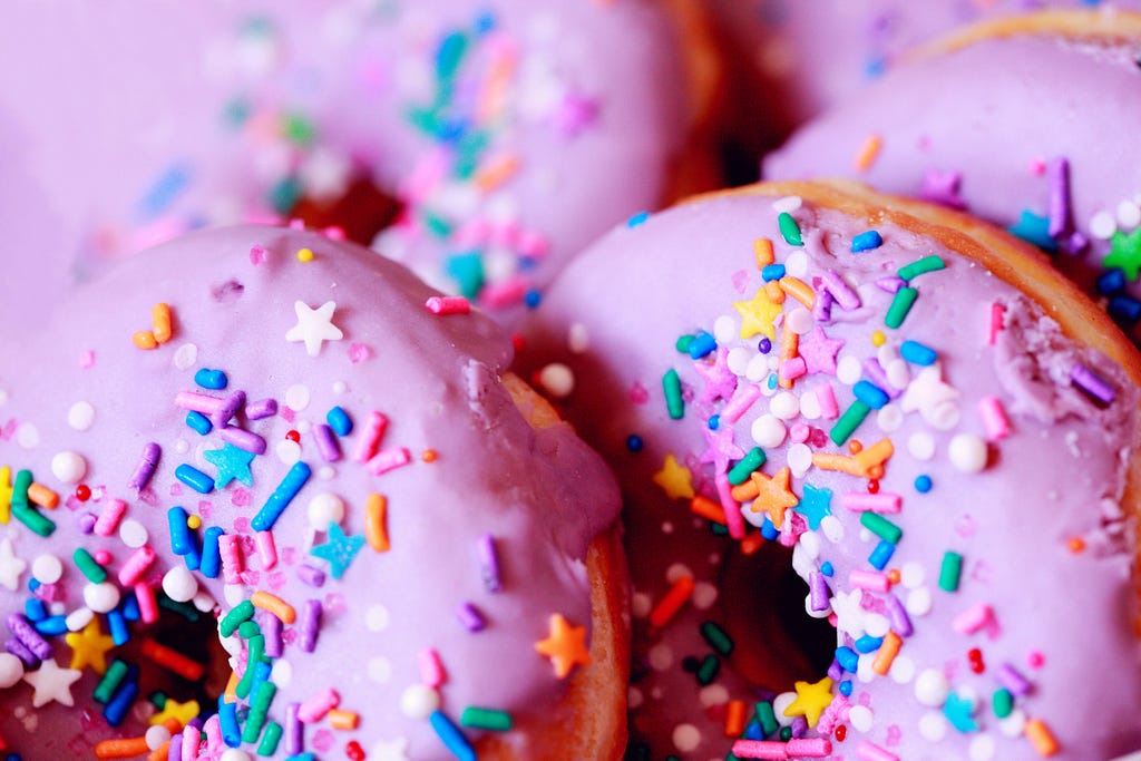 Brown and Pink Doughnut With Sprinkles