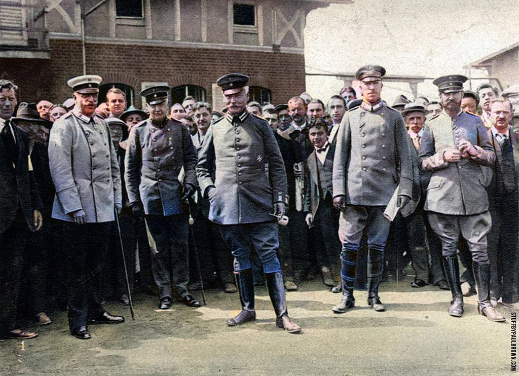 Ruhleben staff: Count Schwerin on left, Baron von Taube in center.