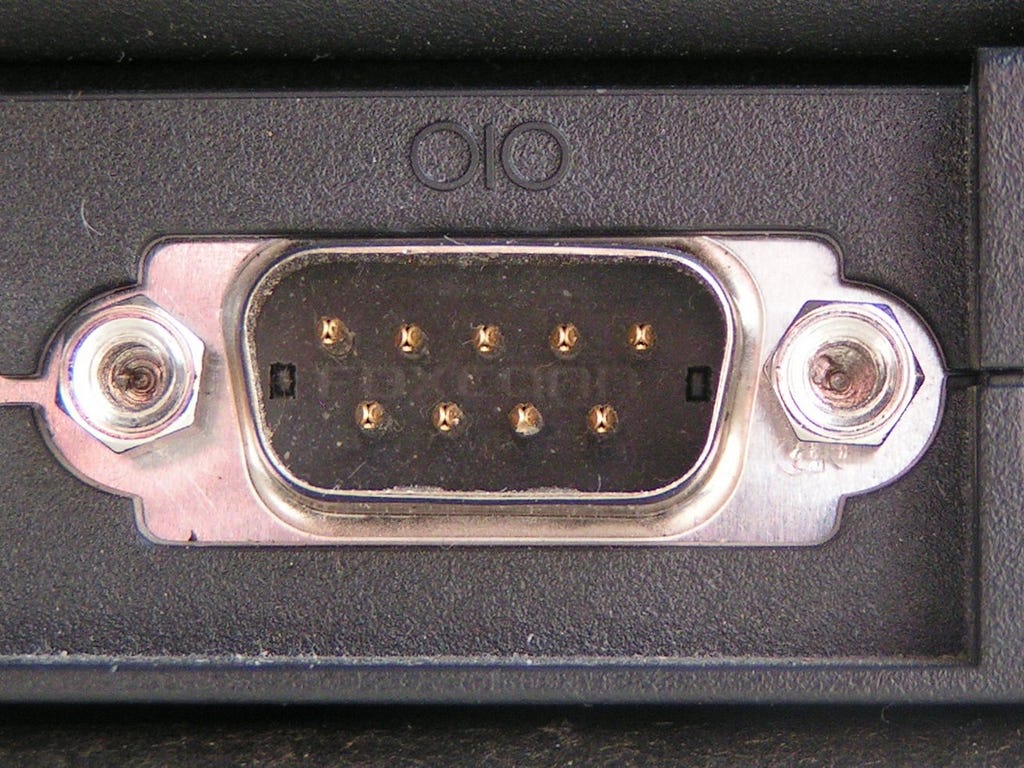 A 9 pin serial port in close-up.
