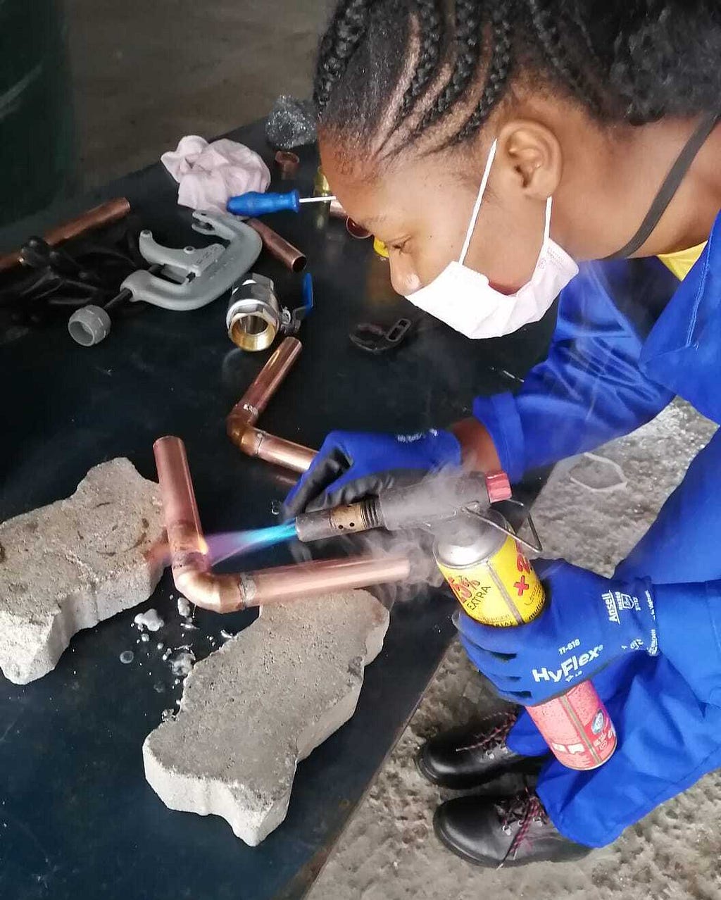 Learning the tricks of the plumbing trade during workplace exposure in South Africa