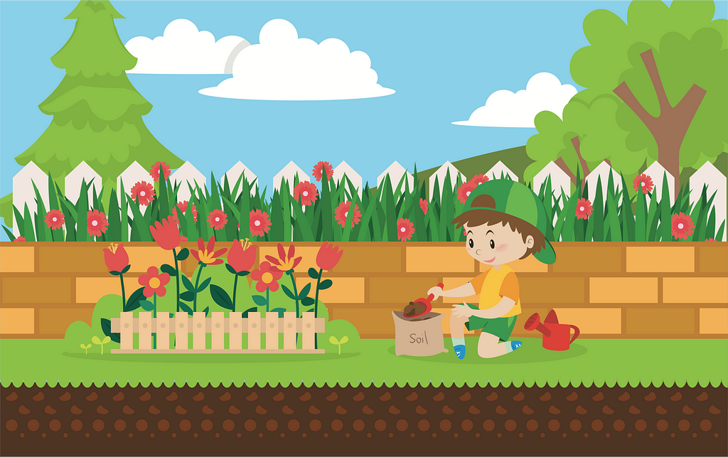 A boy uses a small shovel to pull soil out of a bag while sitting next to a flower patch