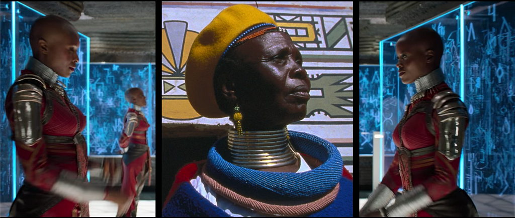 In the center is a South African woman wearing traditional clothing; on both sides are female warriors from Black Panther.