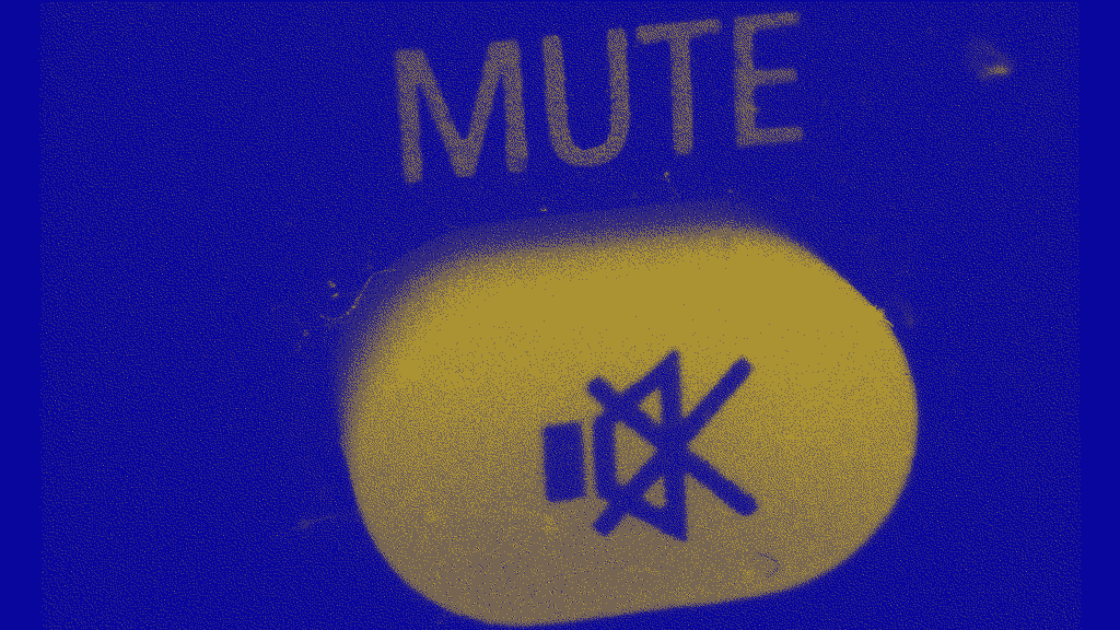 A mute button on a piece of audio equipment.