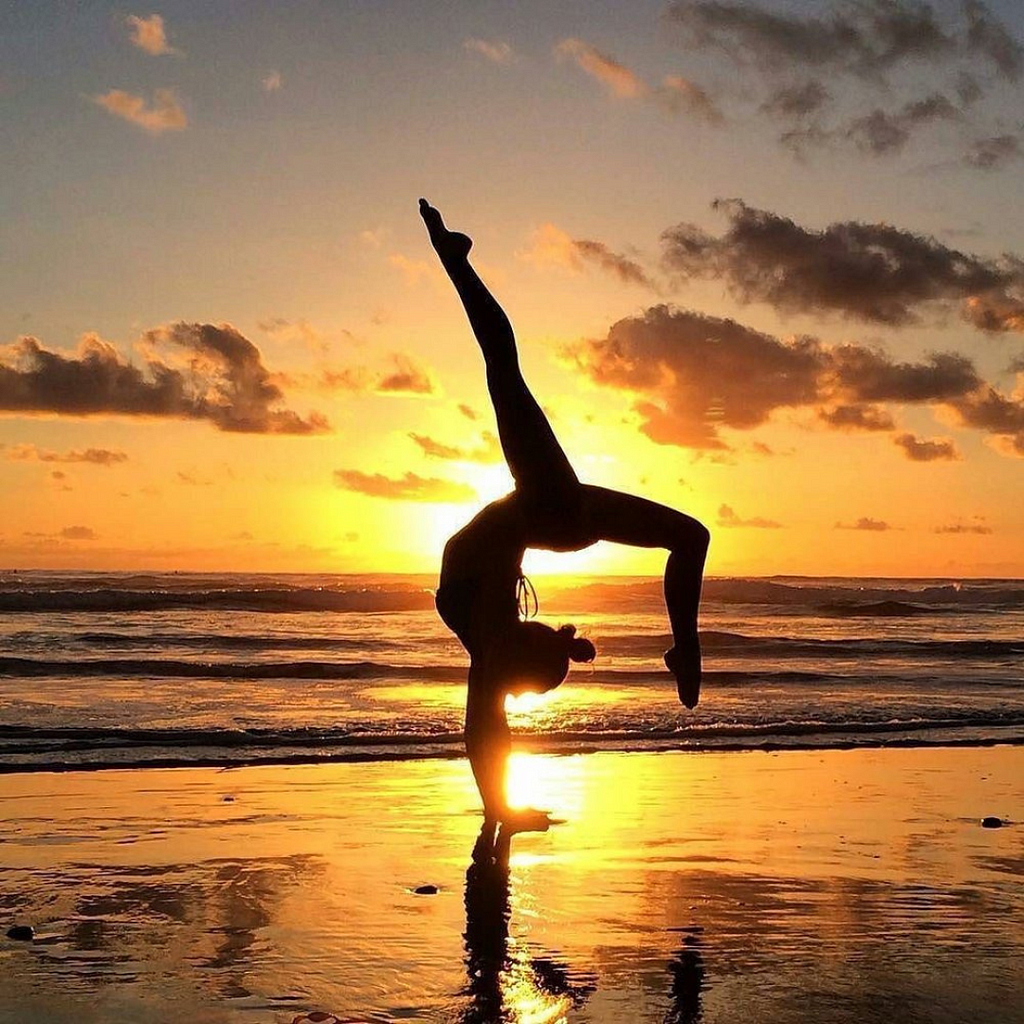 A yoga pose on the beach