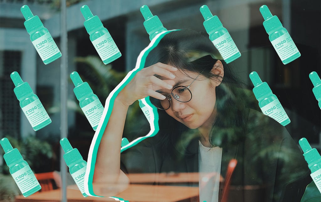 Cannabis and cannabinoids could be the ideal anxiety-beating mediation. Picture of a stressed-out woman. Tincture bottles.