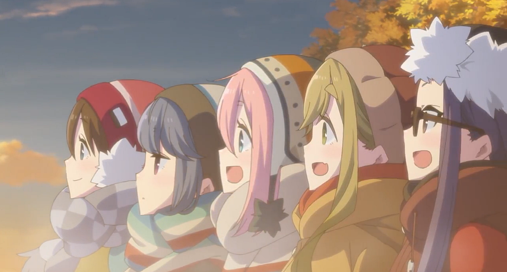 A screenshot from Laid-Back Camp showing the main cast of characters excited about a camping trip.