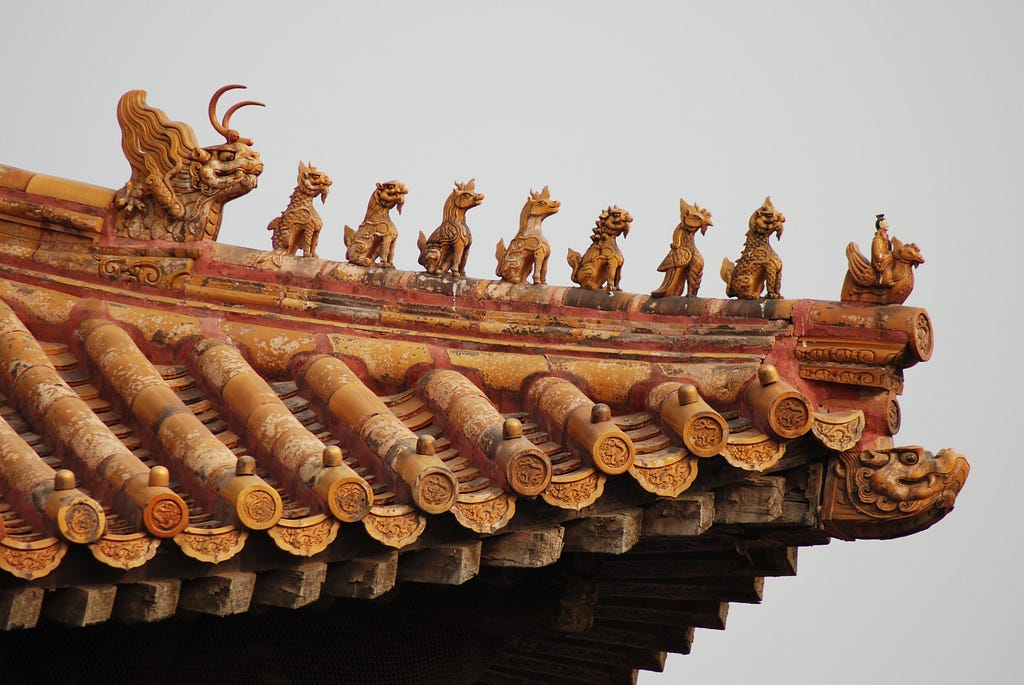 An ornate rooftop carving