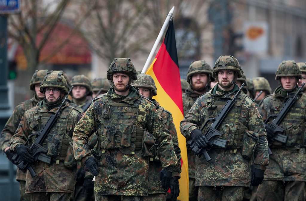 Members of the German Army (The Bundeswehr) attend a military parade ceremony marking the 99th anniversary of the Lithuanian military. Image source: https://sofrep.com/