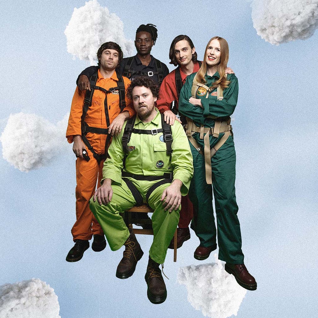 A photo of Metronomy from the set of their new video