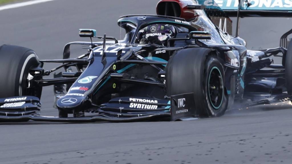 Seven-time F1 world champion Lewis Hamilton completing his last lap of the 2020 British Grand Prix on three wheels, driving at 143mph.