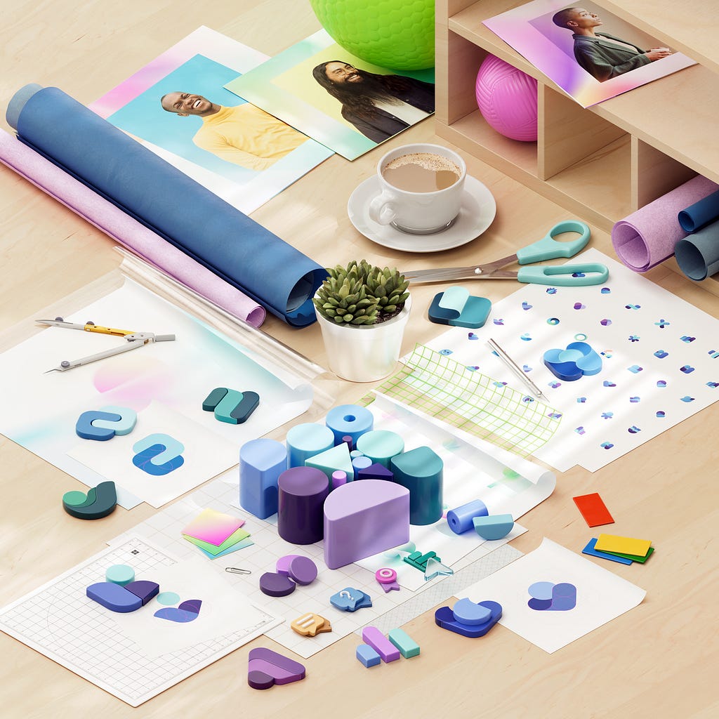 This image goes back to the original set created by Anthony Dart, again showing the desk with 3D objects. In this image, we start seeing the building blocks of the iconography, including the shapes and colors that will go on to form the eventual icons.