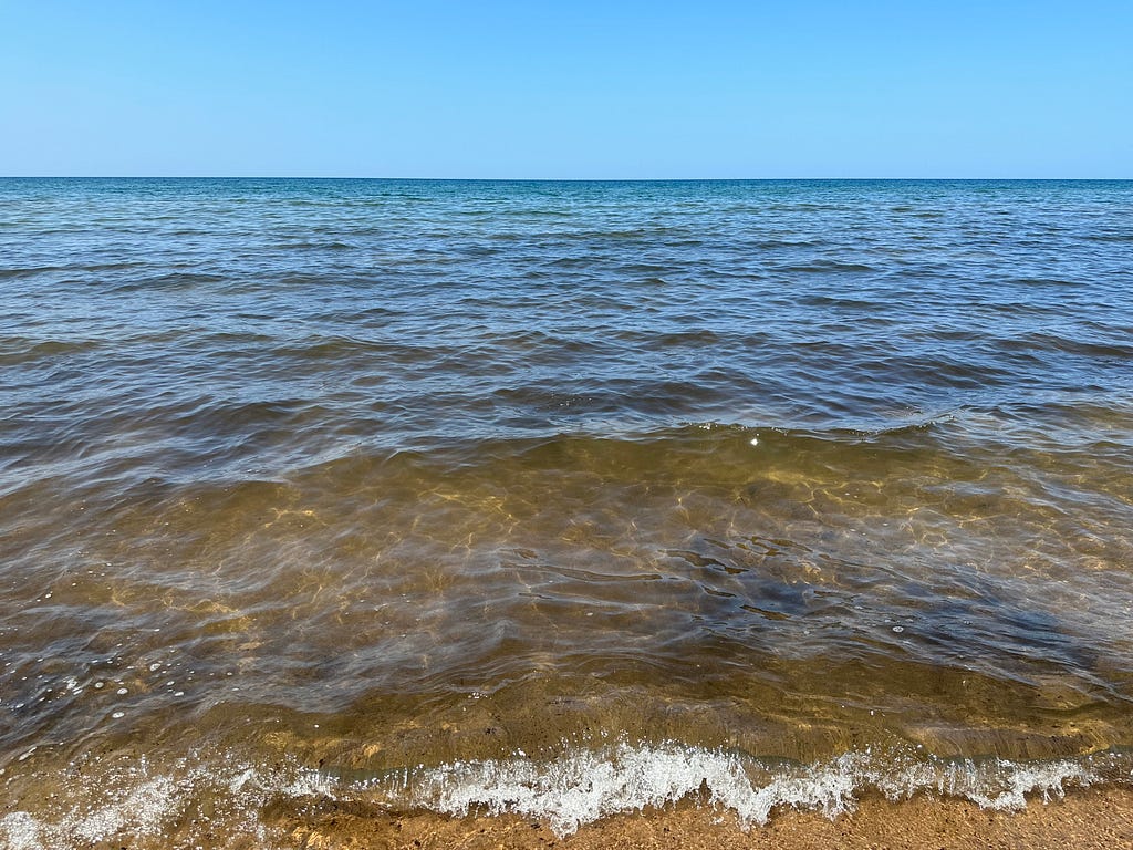 Waves splashing along the shore of Lake Michigan