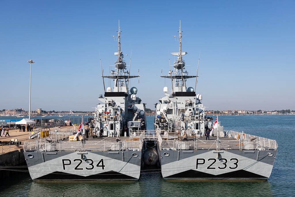 From left to right: HMS Spey and Tamar together prior to their departure from Portsmouth.