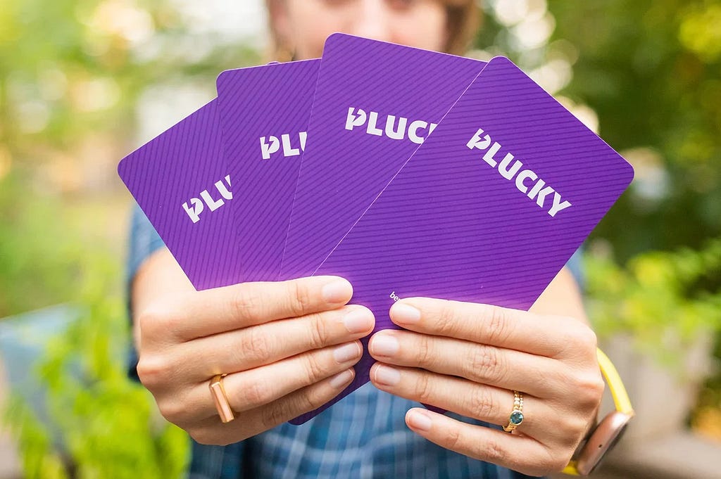 Fanned out Mentor Pack cards, purple side showing.