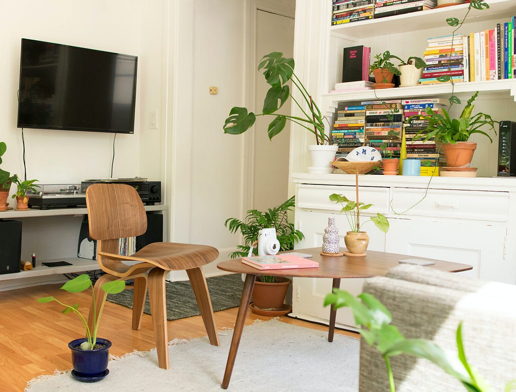 Wooden Eames chair in living room.