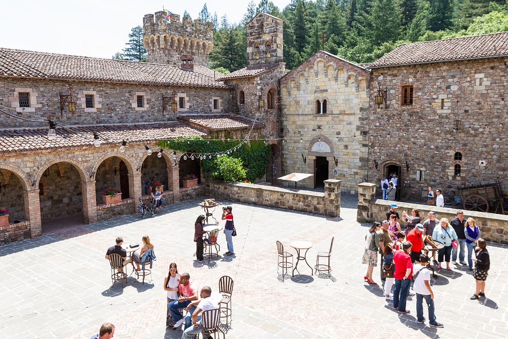 Tourists visit the Castello’s inner courtyard