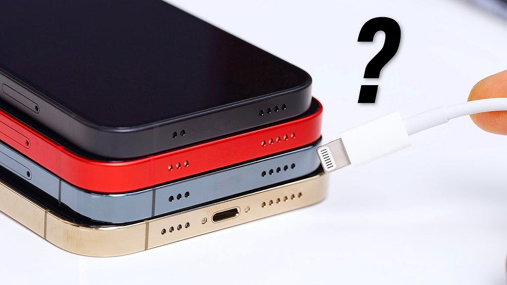 The image depicts multiple iPhones stacked on top of one another. They are all showing the bottom of the iPhones. The bottom iPhone has a [Lightning] charging port while the others on top of it have no port whatsoever. This image does not confirm the existence of a portless iPhone.