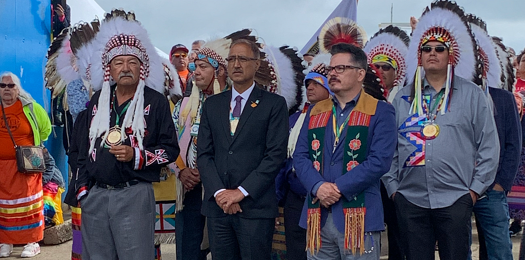 Mayor Sohi standing with Grand Chief George Arcand Jr. and Deputy Mayor Aaron Paquette at Maskwacis event.