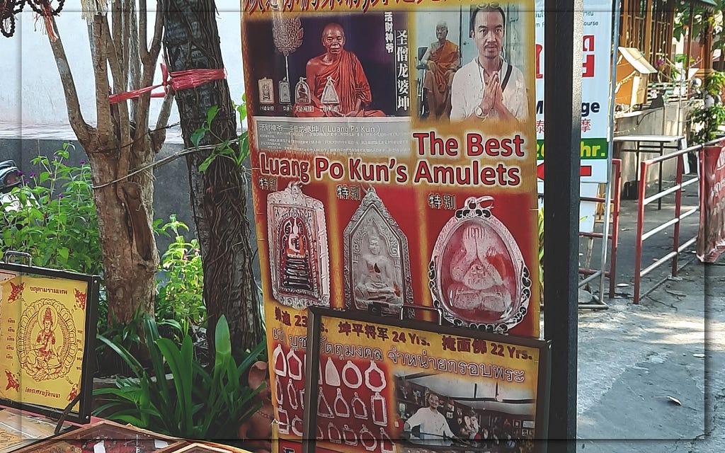 A photograph of an amulet vendor in Chiang, Mai.