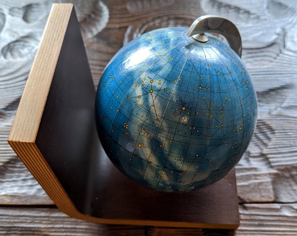 A bookend featuring a globe