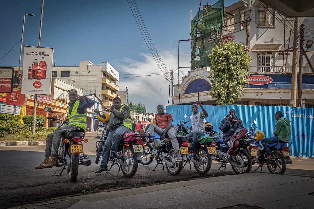 People on motorbikes.